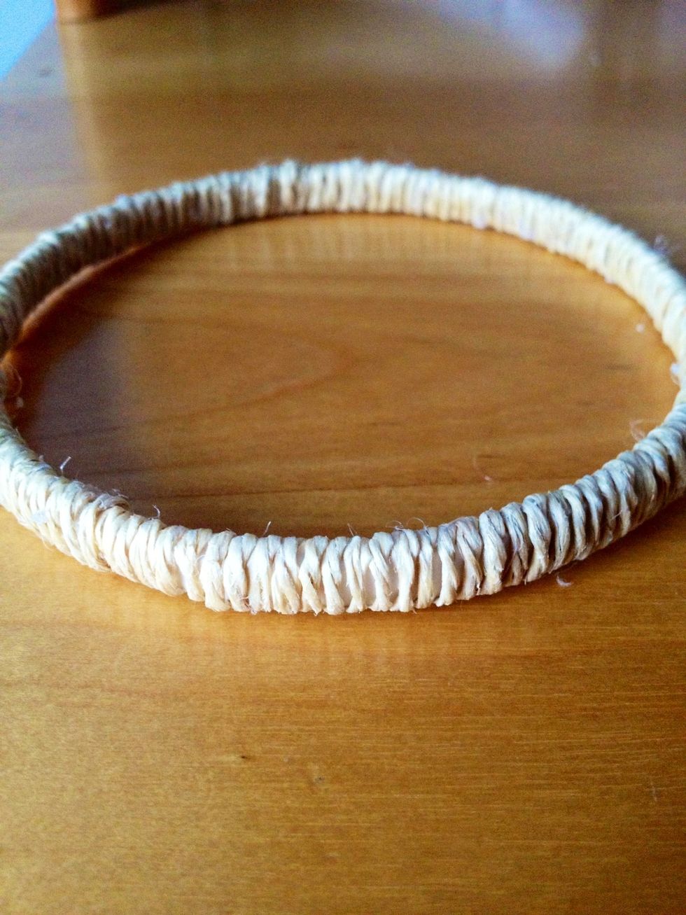 The ring is completed! I found that twine takes longer than string, but I love the "earthy" look of it.