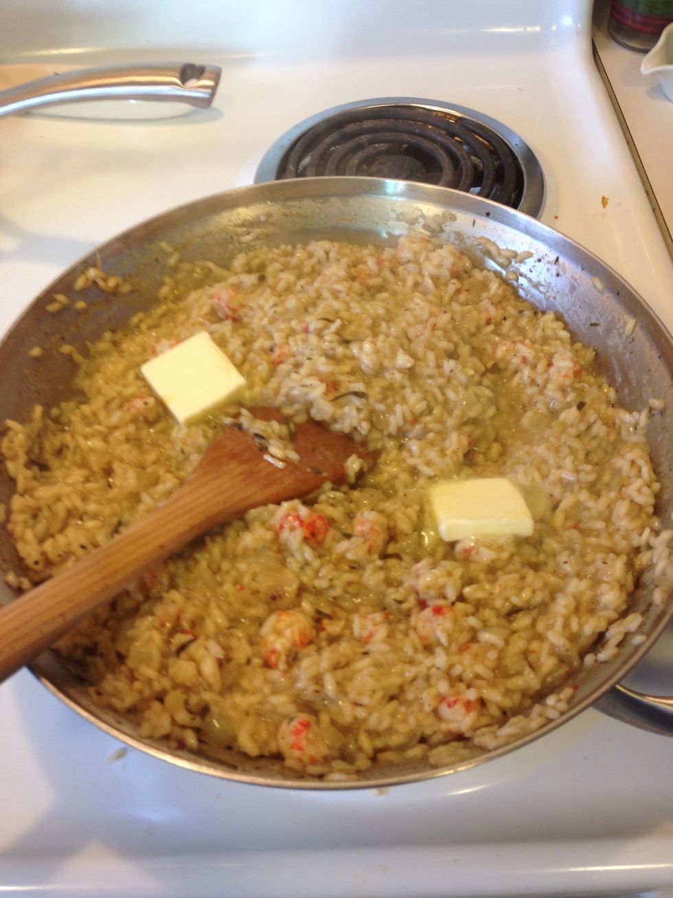 The risotto is cooked here, but you want to add 2 tablespoons of butter and mix