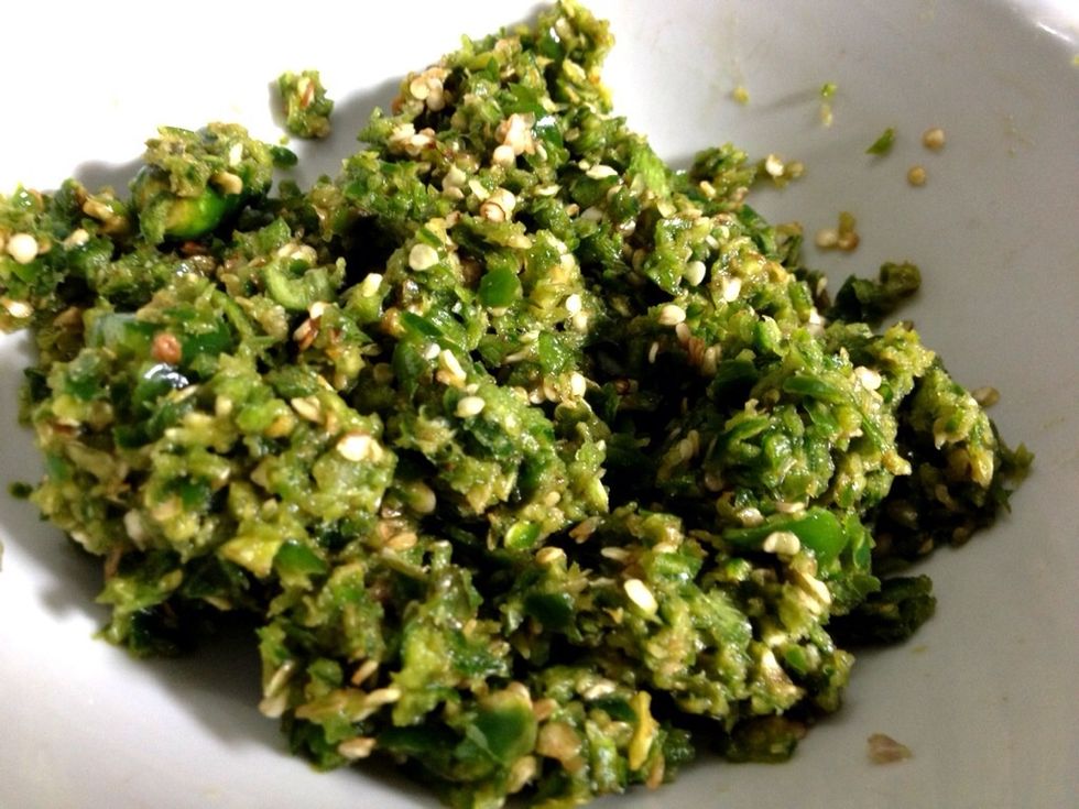 The roughly mashed green chilies! You can also combine the big green chilies with the small one (bird's eye)