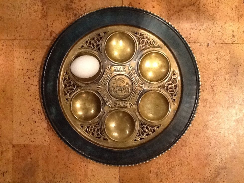 The round shape of the roasted egg symbolizes the cycle of life with the perpetual hope for new beginnings. The egg also symbolizes spring since Passover is celebrated during that season.