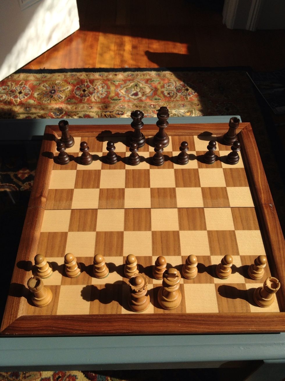 The royalty needs a castle, or two. The rooks, or castles, are placed at the edges. They move in non-diagonal lines, as far as they can go, back and forth. These are your 3rd priority.