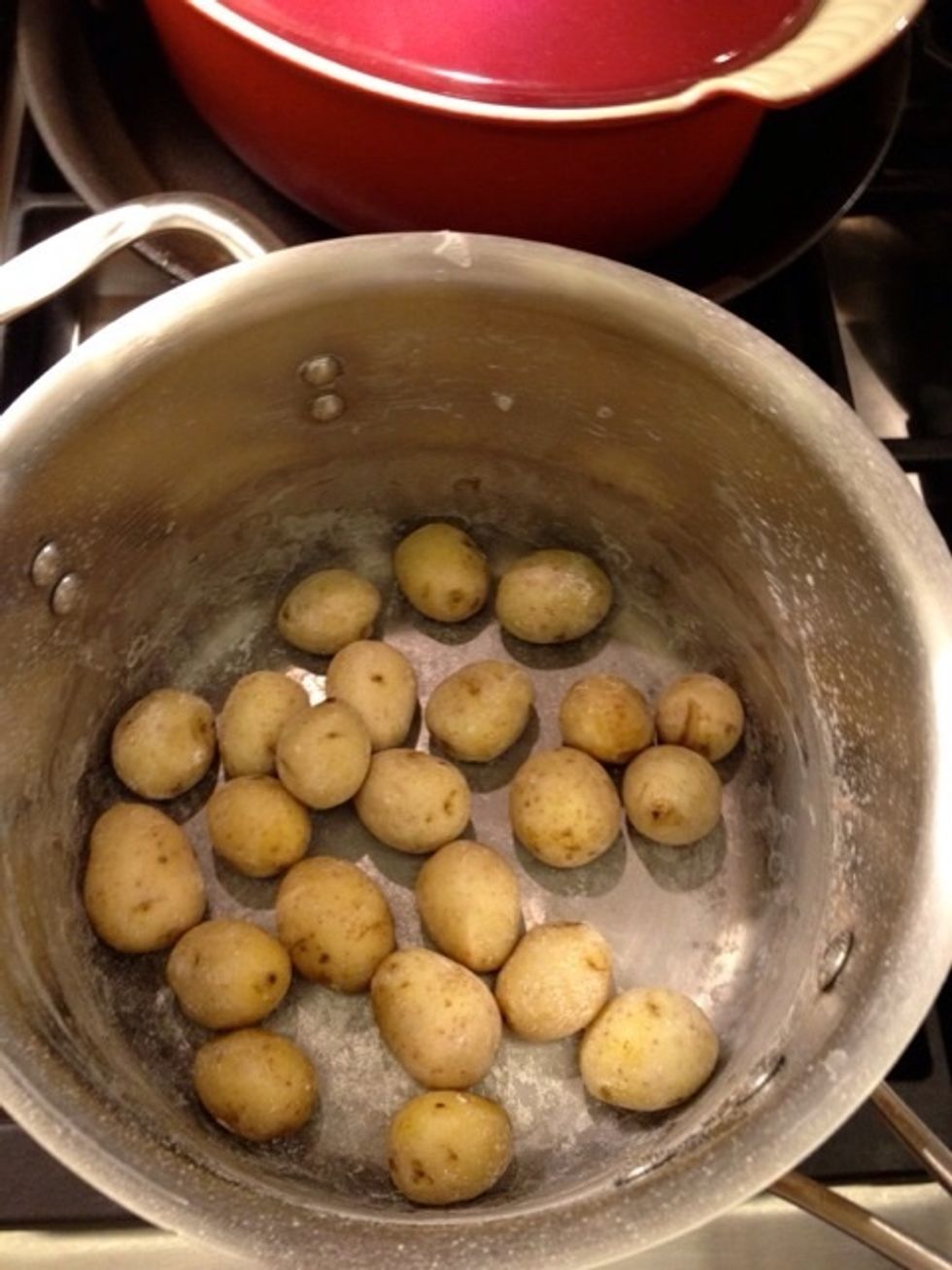 The salt starts to appear again. Just keep moving the potatoes so they "roast" in the salt.