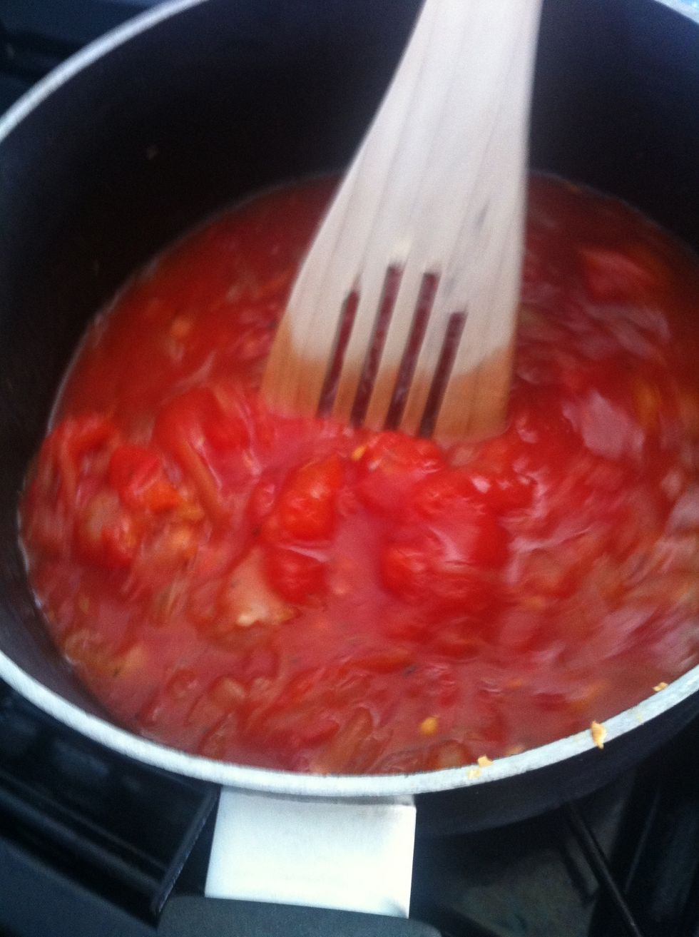 The Sauce: Peel & chop the onion. Peel & crush the garlic cloves & fry gently in Olive Oil to soften. Add sugar & the dried herbs & fry a bit more. Add tin of tomatoes & cook until it is a thick paste