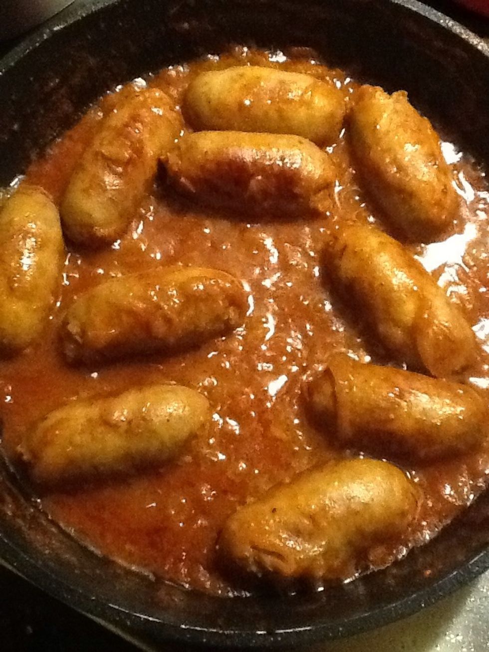 The sauce should be pretty thick now. If it isn't turn up the heat to reduce it. If it is too thick add some water. It is good to have enough liquid to soak into the potato.