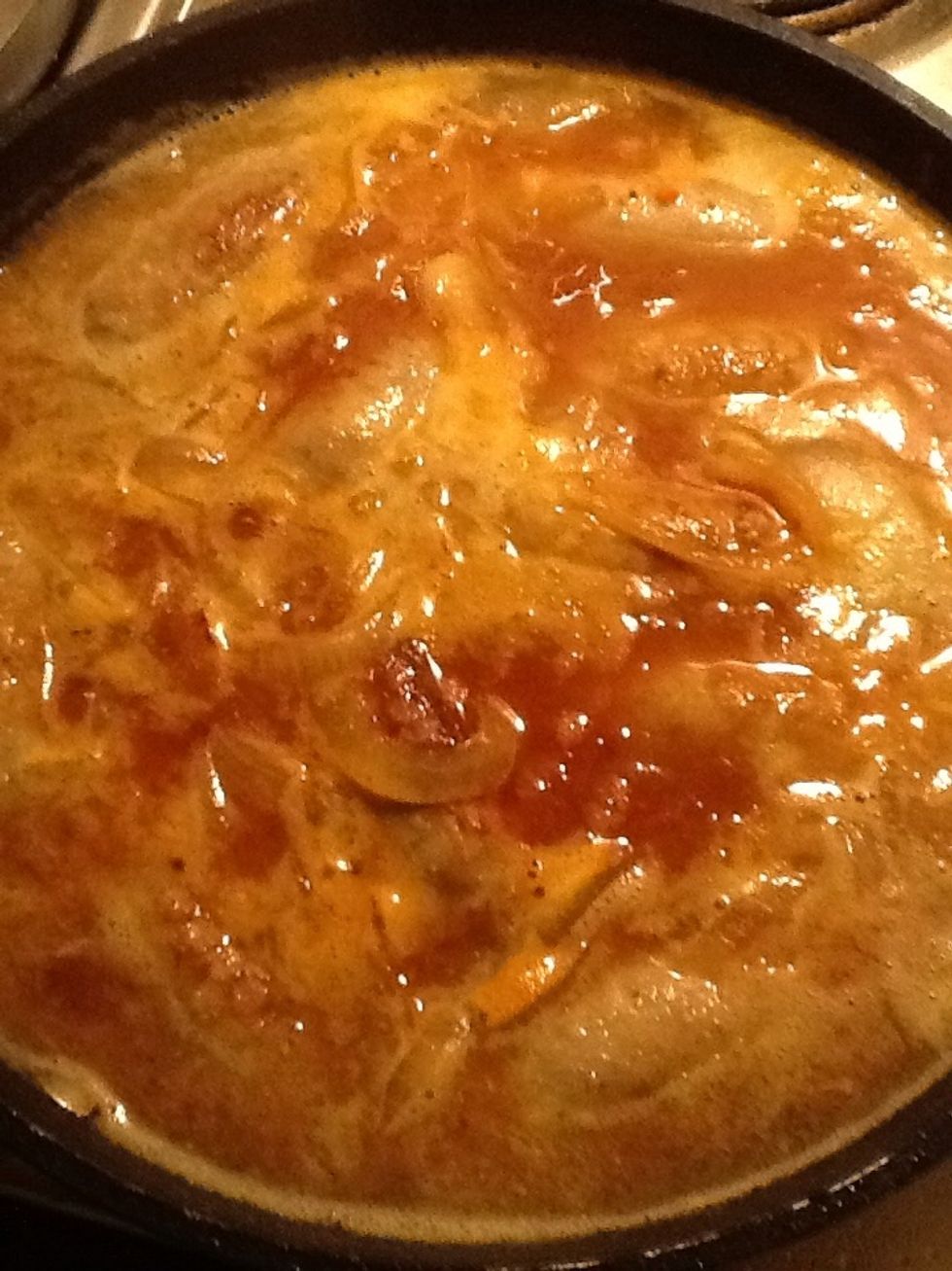 The sausages should be pretty much covered otherwise add more water. Simmer slowly for at least 1/2 an hour. An hour is better. If they get too dry and start sticking add more water. Stir occasionally