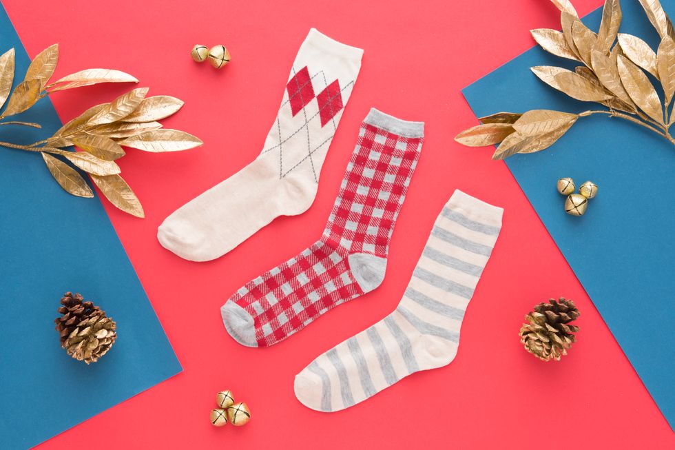 The season is upon us, so we are kicking it into high gear, DIYing gifts + wrapping presents galore!  We teamed up with JCPenney to turn three socks into a headband to keep your ears warm.