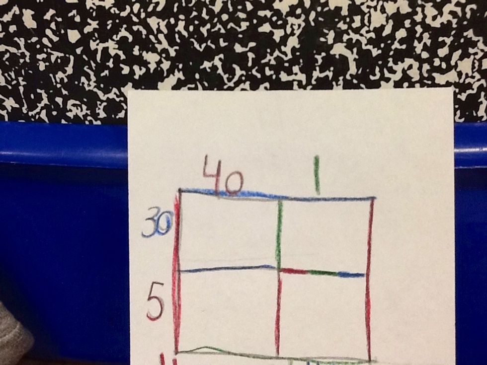 The second thing you do is make a square and divid it into 4