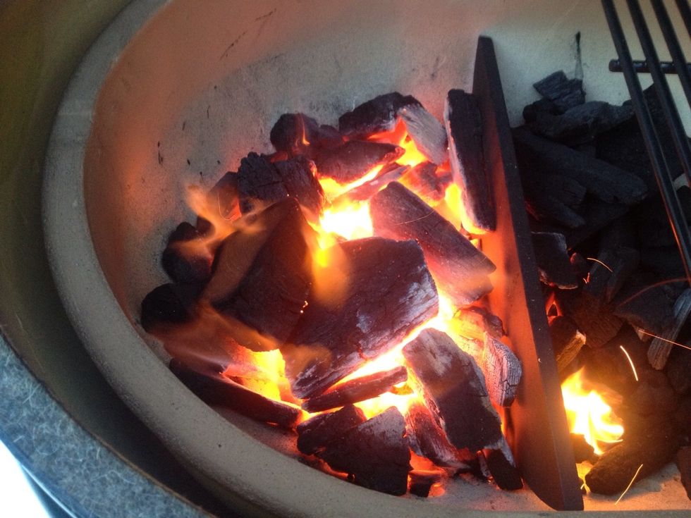 The secret to great juicy steaks is a good sear on the steak. Start a good hot fire on one side of your ceramic grill.