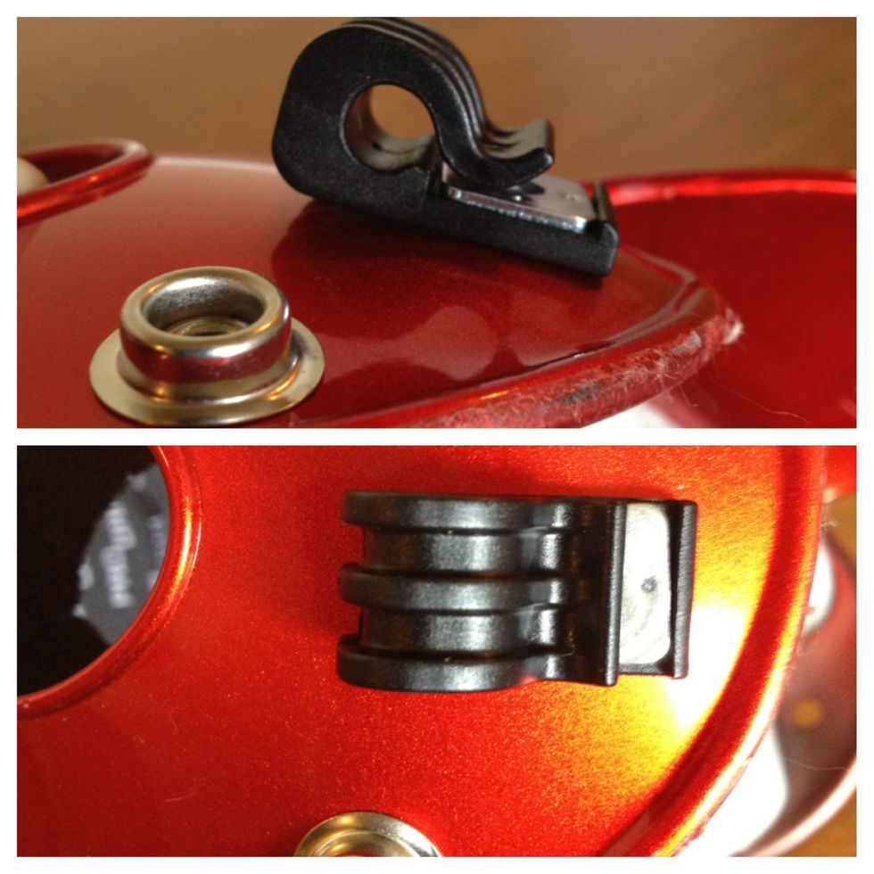 The side clips should sit so that the opening faces to the front if the helmet. The top clip opening should face to the back of the helmet.