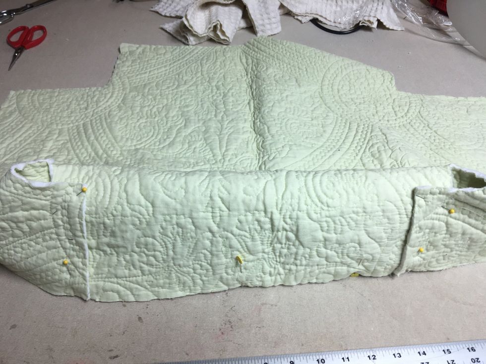 The side drop has to wrap around the leg and behind the back drop.  I have it pinned wrong side out so you can see what it will look like from the back.