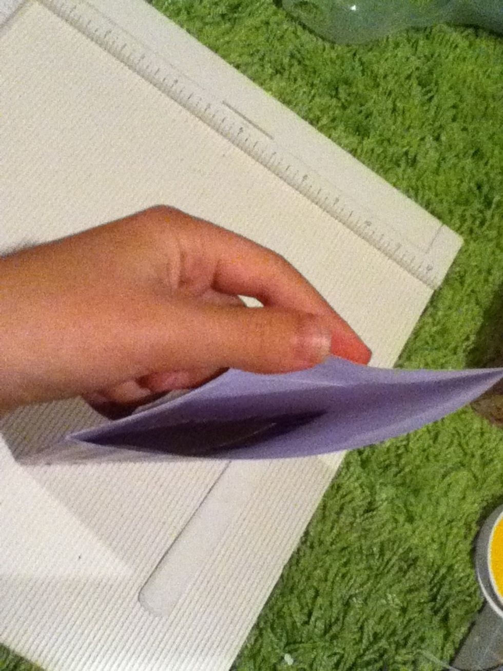 The side with no fold will be called "B".