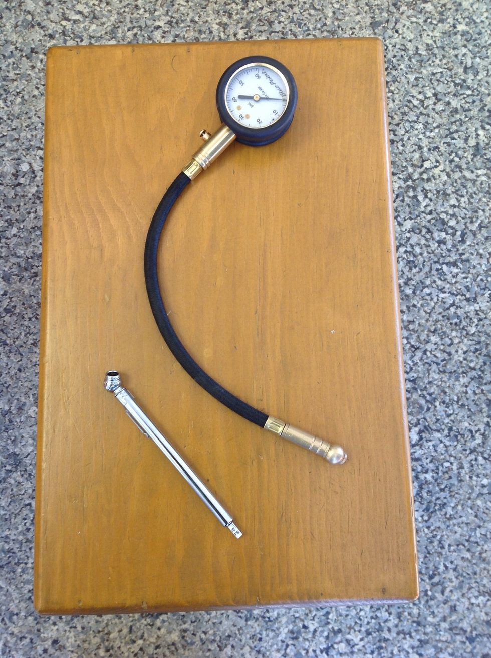 The slim, pencil-like gauge is most common, and good in a pinch. The dial gauge is more accurate and recommended by our mechanics. Tire gauges can be found at automotive parts stores and Wal-marts.