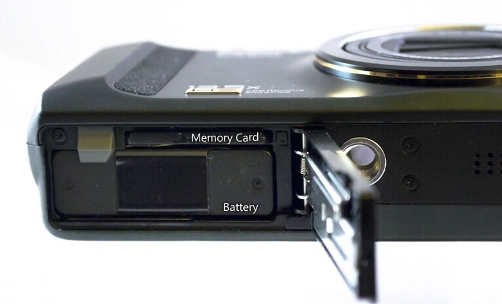 The slot for the memory card ( SIM card) and battery