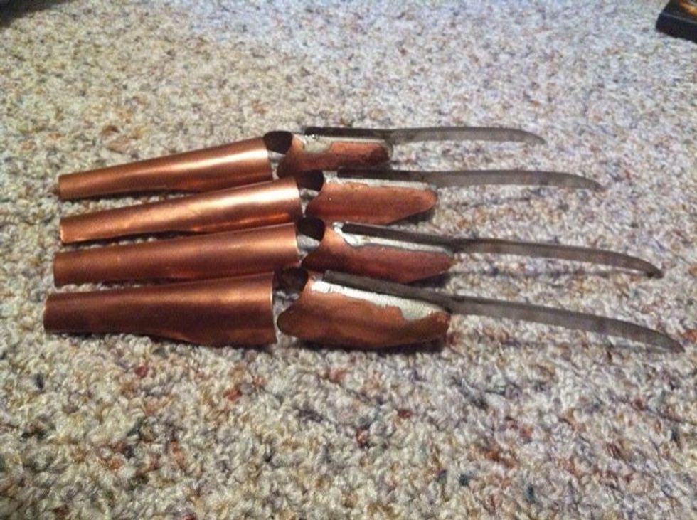 The solder does not have to be clean and even, remember: a rough look is better; Freddy made these gloves in his dirty basement.