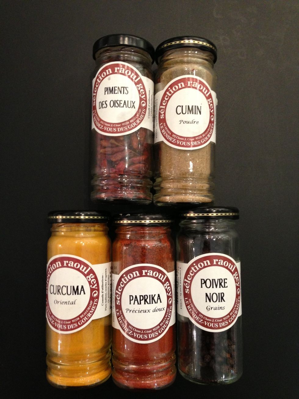 The spices chili flakes, cumin, turmeric, paprika and black peppet