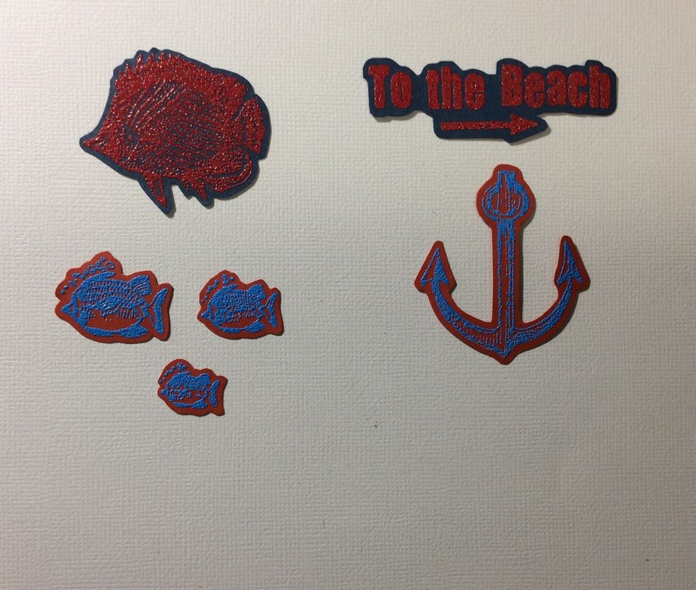 The stamp technique is heat embossing. Stamp images with embossing ink on coloured card stock. Apply powder, any red or blue. Shake excess off. Heat to melt powder to form images. Then fussy cut.