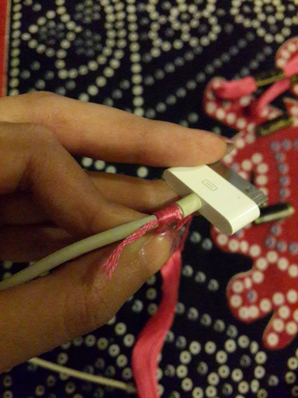 The start wrapping it around. Keep the little extra thread from the knot under the wraps.