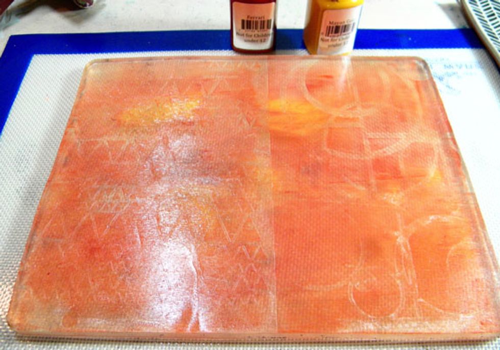 The stencils removed the paint from the plate to create a pattern.  Do this if you want overall color and subtle pattern.