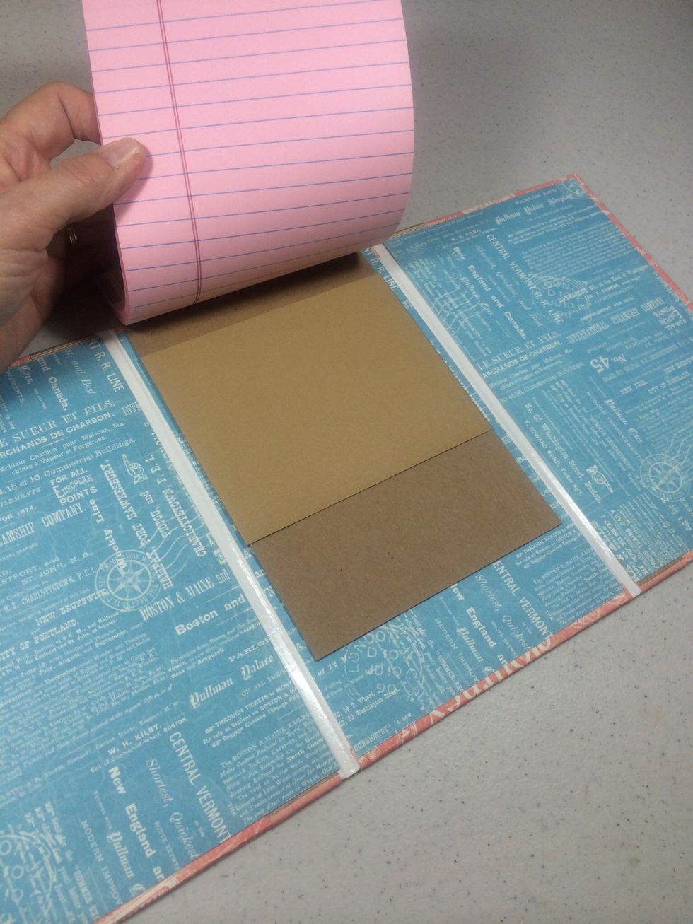 The steno pad can be changed out once all the paper is used up by simply sliding it out of the cardstock sleeve and replacing it with a new one.