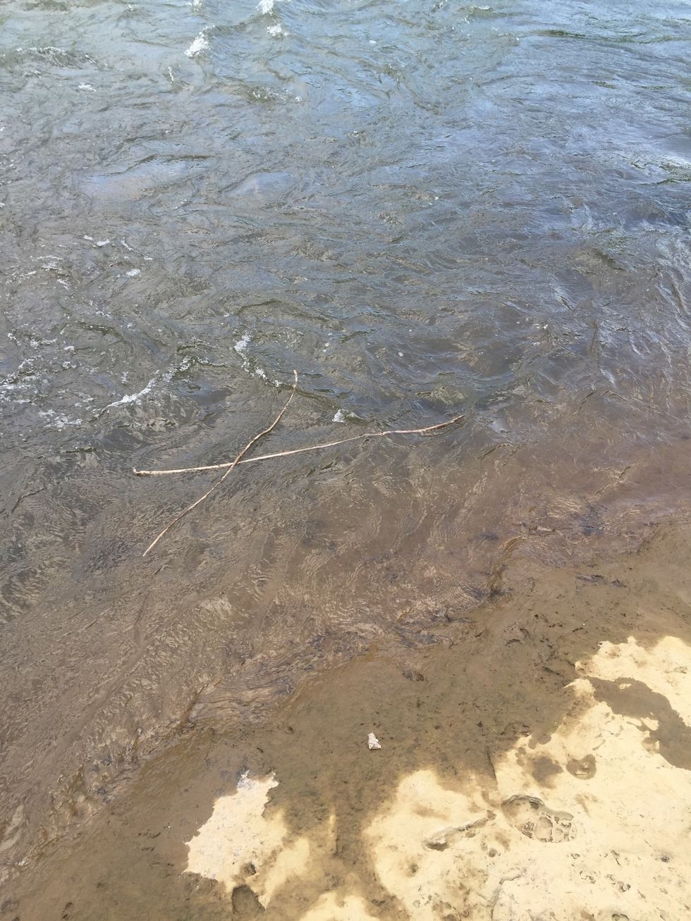The stick hits the side and stops (Deposition)
