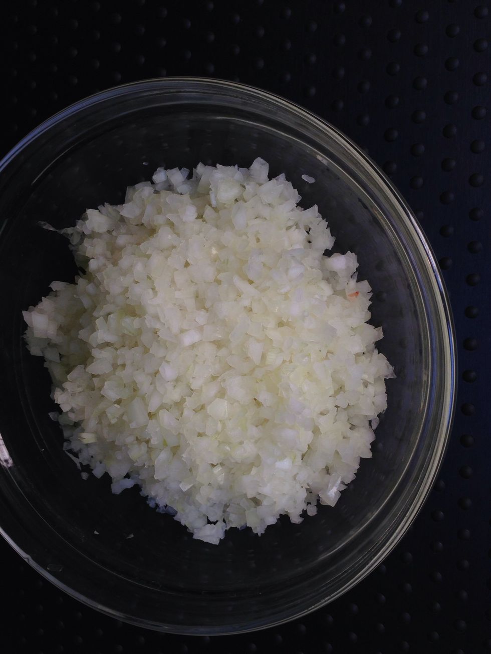 The stuffing is a mixture fried diced onions and fried diced meat + grilled pine seeds + cinnamon.