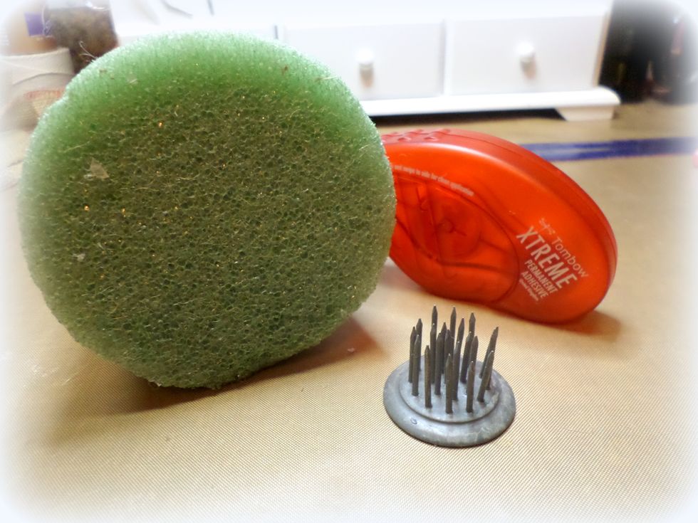 The Styrofoam tree is really light. To give it some weight, I used a "Floral Frog".