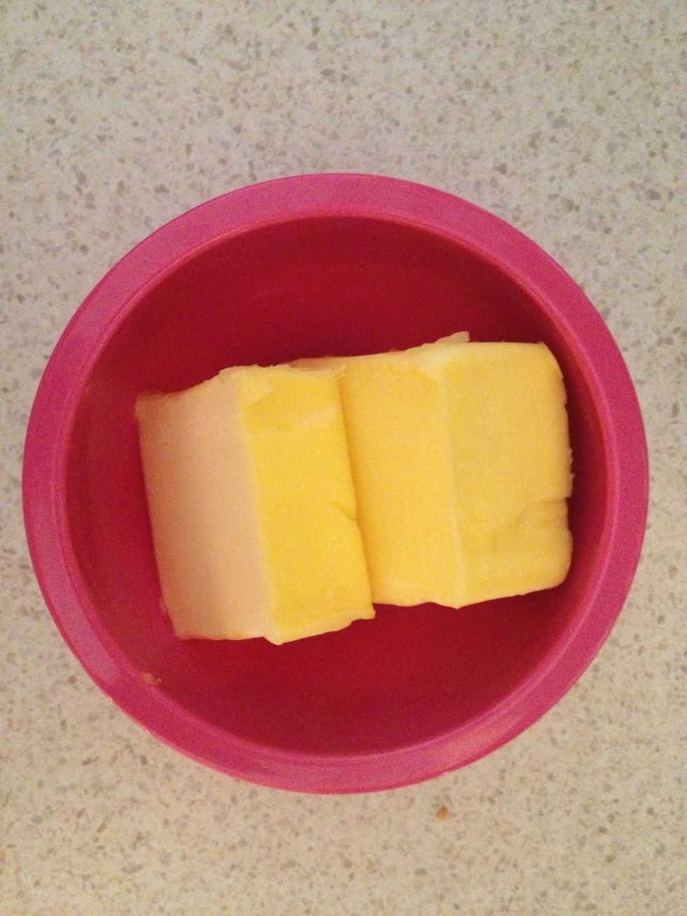 The supplies call for 100g of butter but I usually find this is not enough. You need the base to be moist, not dry or it won't stick together. I usually add 150g