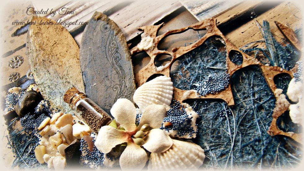 The surfboards were painted with Sorbet - Reef & Kona with Stone Effects on the edge. Embellies were add including some seed beads for just a little more texture.