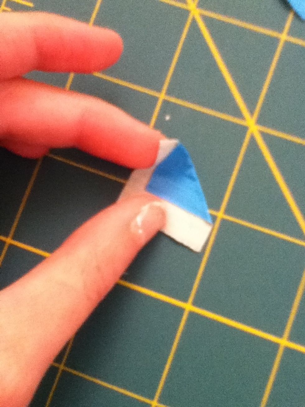 The take the other corner and fold it over...