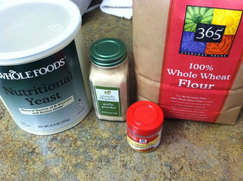 The tamari is not pictured. And you can use regular flour (I'm using whole wheat for this one) It is important that you use extra firm tofu, or the scramble will be kind of soggy.