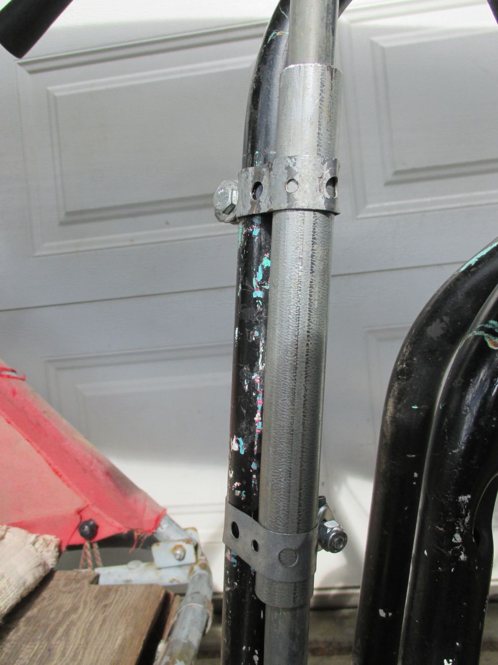 The tape clamps the 1" conduit to the frame tube leading towards the handle bars. 2 pieces of tape per tube, one at top, one at bottom.