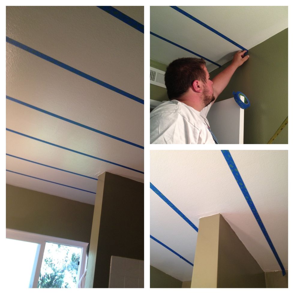 the tape needs to be really stuck to the ceiling so that the paint doesn't seep through. if you have an obtrusive wall, like we do, keep going as if it weren't there - keep it clean and conform.