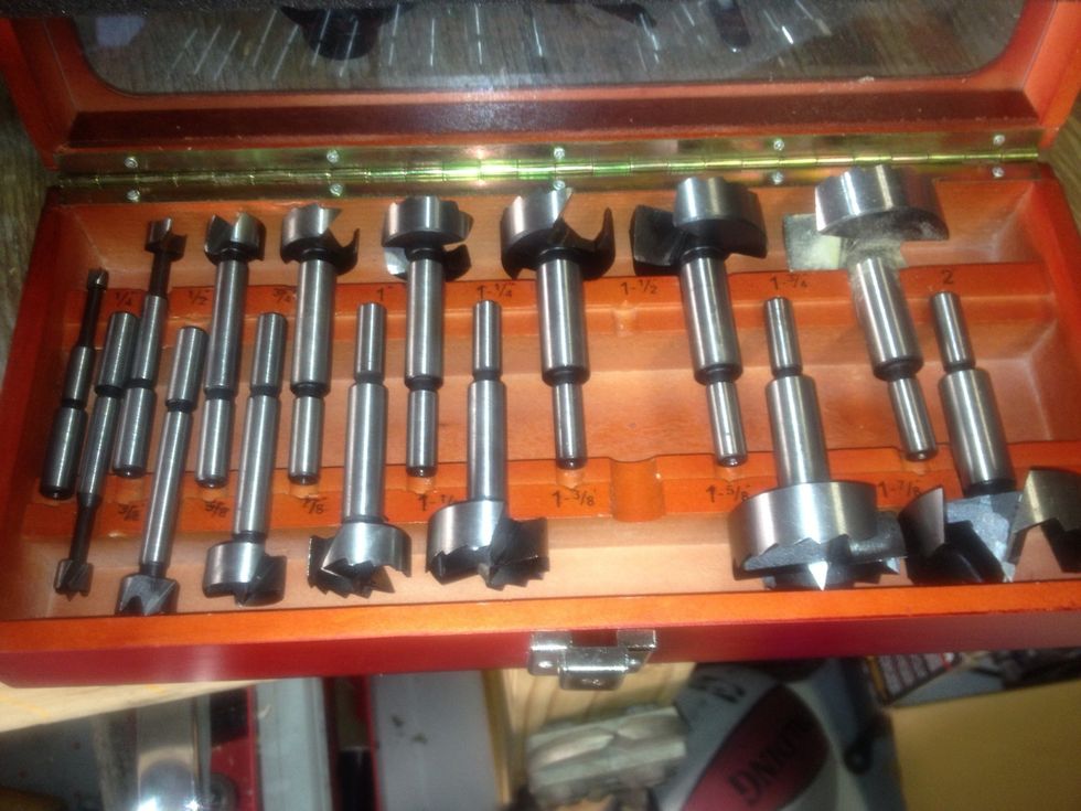 The tea candle fits in a 1 3/4" Forstner bit