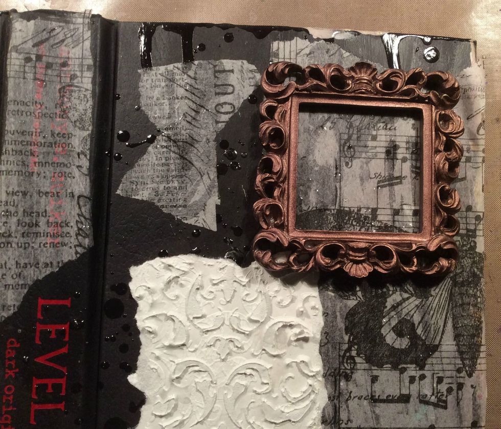 The textured piece is a piece of white cardstock that had been stenciled with modeling paste from an old project. I don't throw away anything. I just glued that on for added texture. Add your frame