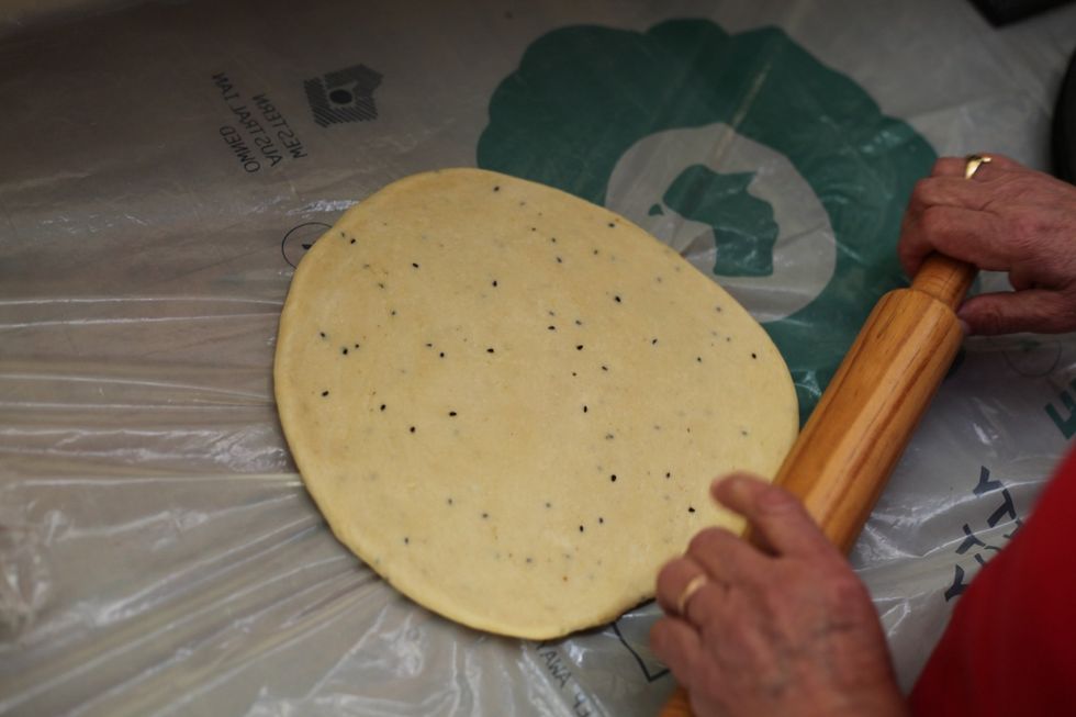 The thickness of the dough really depends on how thick you want your biscuit to be. Around 1.5 cm should do it. Remember thicker biscuit, different cooking time.