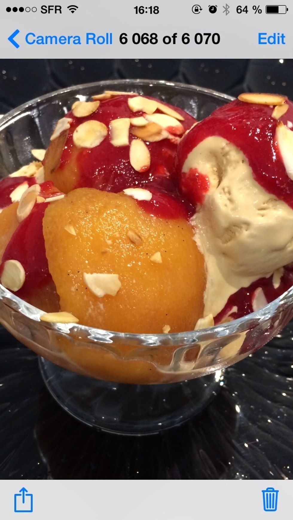 the three elements are there. The poached pears, the raspberry sauce and the vanilla ice cream. for garnish; slivered almonds slightly toasted.