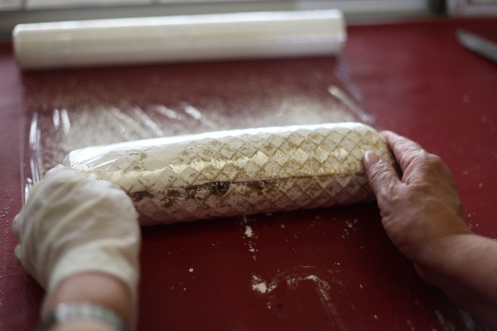 The tighter the wrapping the easier it will be to cut and serve.