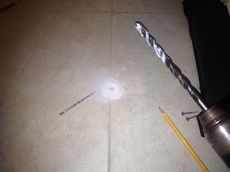 The tile was the hardest to get through, my drill has a hammer setting and it helped a lot
