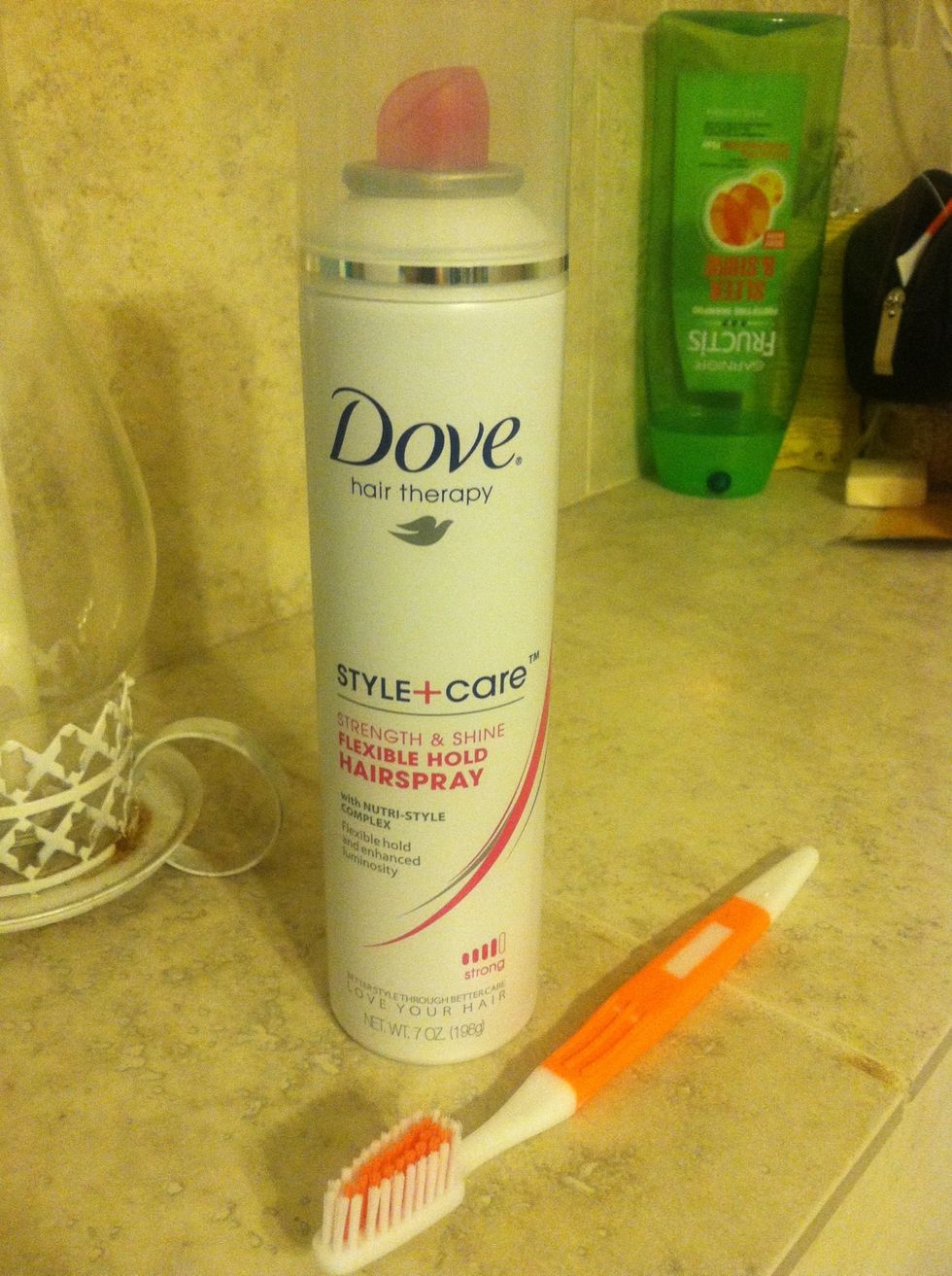The tools: a can of desired hairspray and a toothbrush! I recommend using a flexible/light hold hairspray. It'll keep your hairs back without the heavy, oily, "I put too much spray in my hair" look.