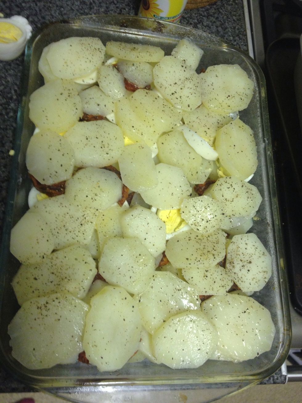 The top layer should be potatoes again so make sure you have enough. You start with potatoes and you finish with them. I had 3 layers of each. I also sprinkled the top layer with pepper (and salt).