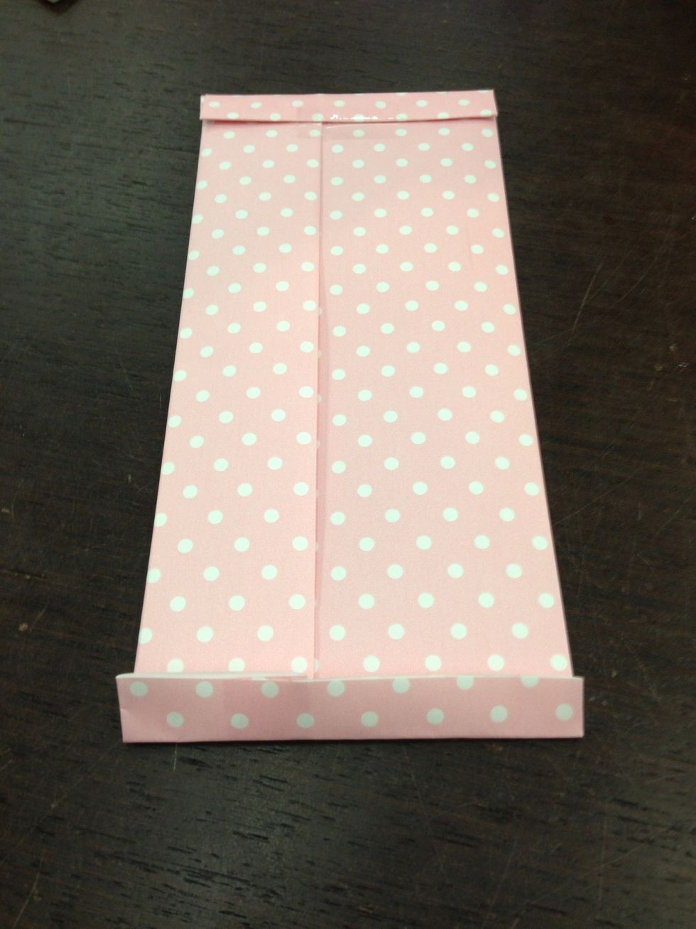 The top should be about 4-5cm higher than money. Fold the top once