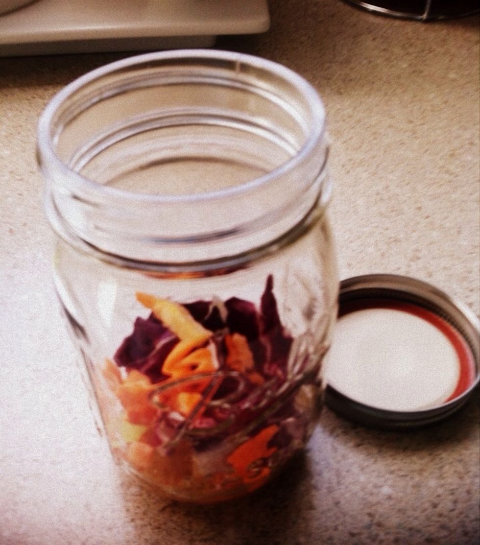 The trick is being able to add your dressing in the morning AND keep ingredients crunchy. Notice that I added dressing and my "hard veggies" like carrots and red cabbage, first (at the bottom).