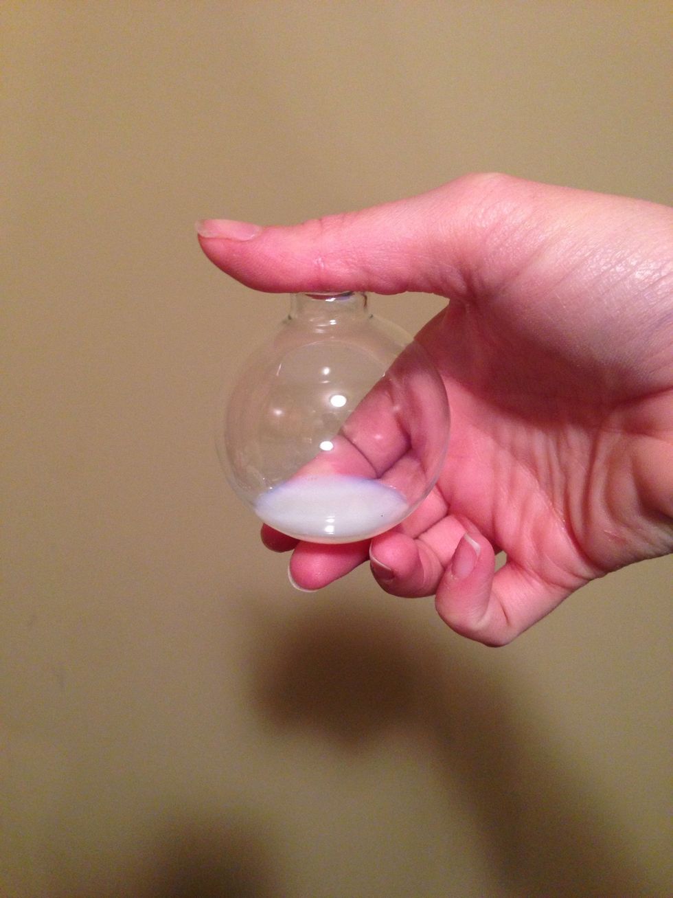 The trick is to swirl.. Not shake! Shaking leads to bubbles and we want our ornaments coated evenly. Don't forget to flip upside down!