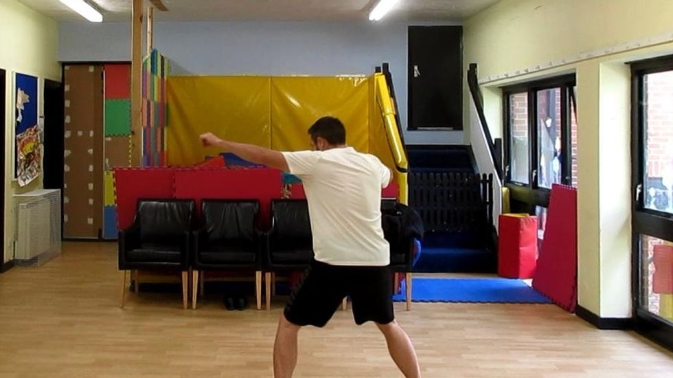 The turning of the foot allows for increased rotation of the body. Imagine pushing off the opponent as you drive in with the punch. Foot is grounded for stability. Heel and outer foot tread forcefully