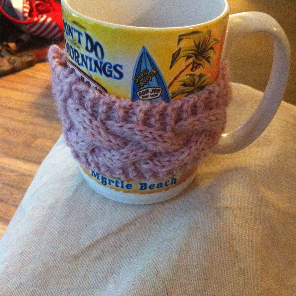 The uhh, manly mug I kind of defaced with a pink chunky cabled cozy that I think looks real pretty. Unfortunately Hubby didn't agree\ud83d\ude1e.