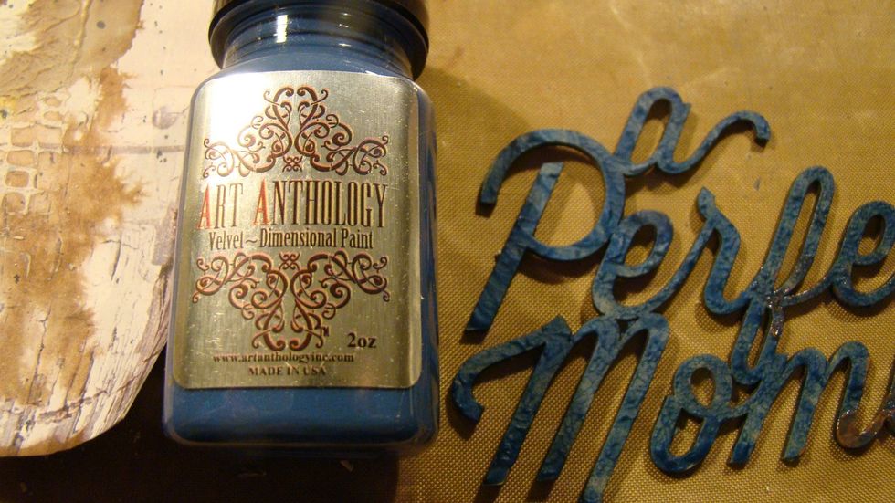 The Velvet's are a bit more opaque and so I chose to use this on my title for my page. It covered the chipboard so pretty.