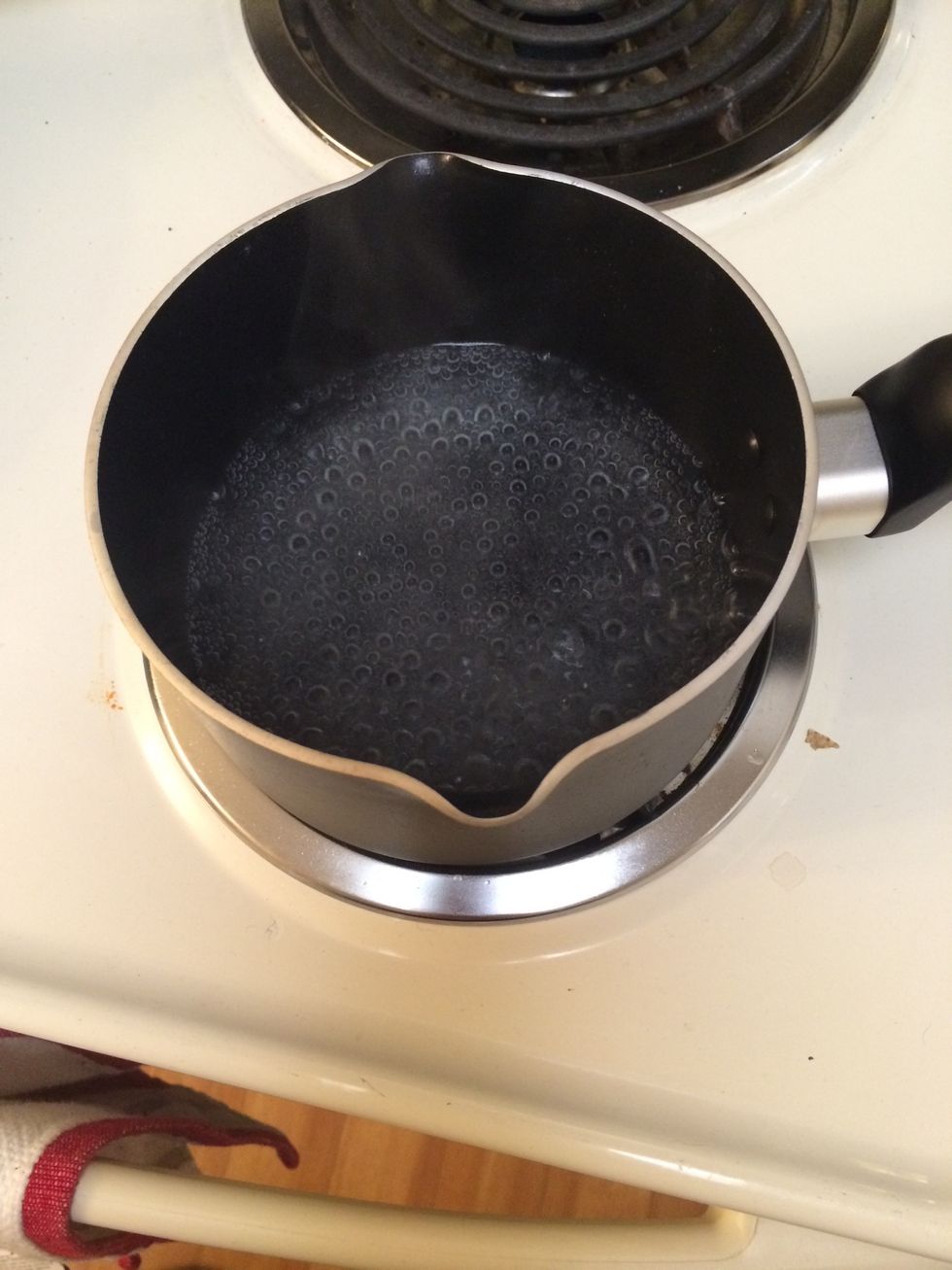 The water for the grits should be boiling by now