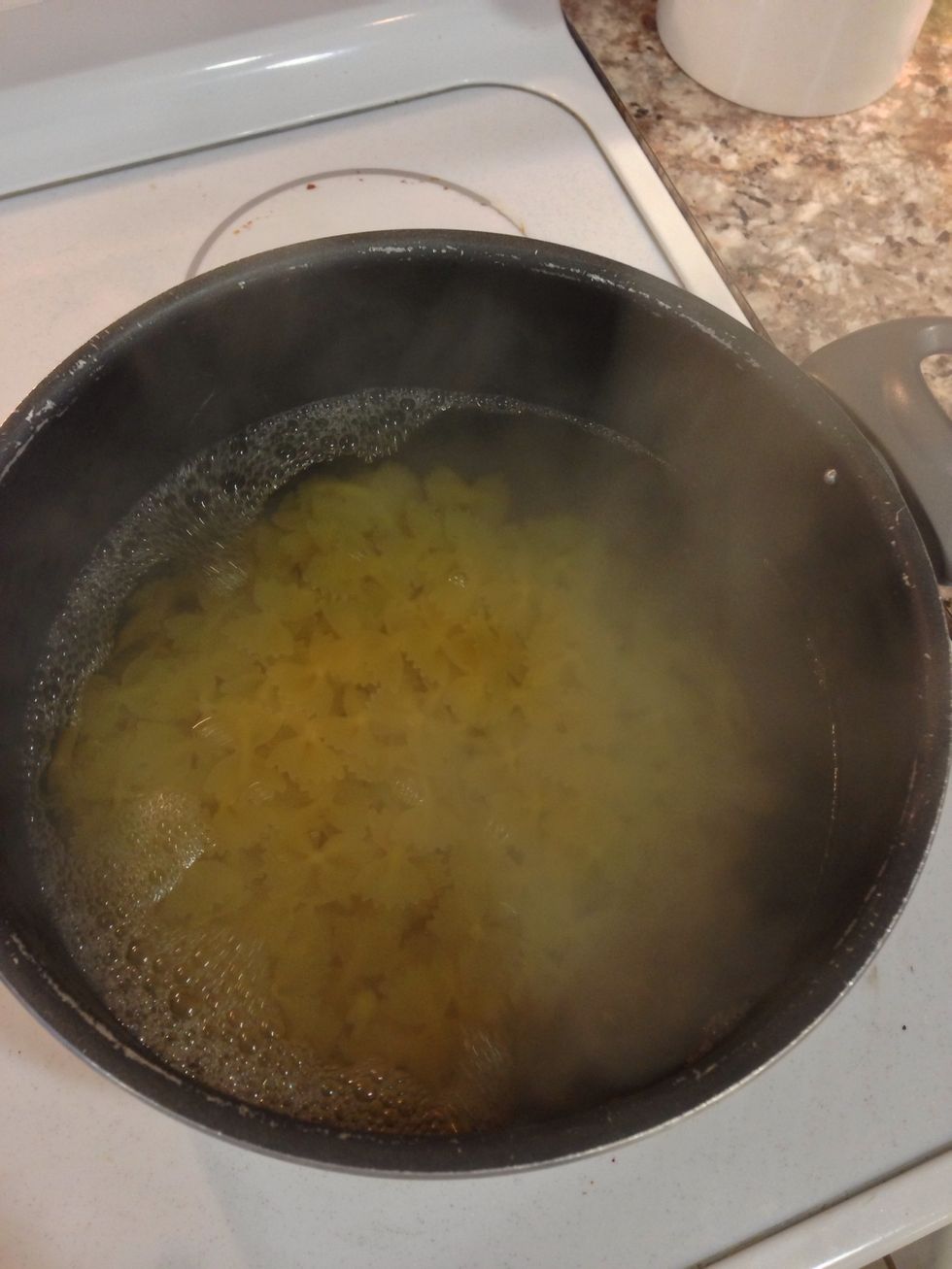 The water should be hot now. When it reaches a boil add the pasta. Remember to stir or it will stick to the bottom!