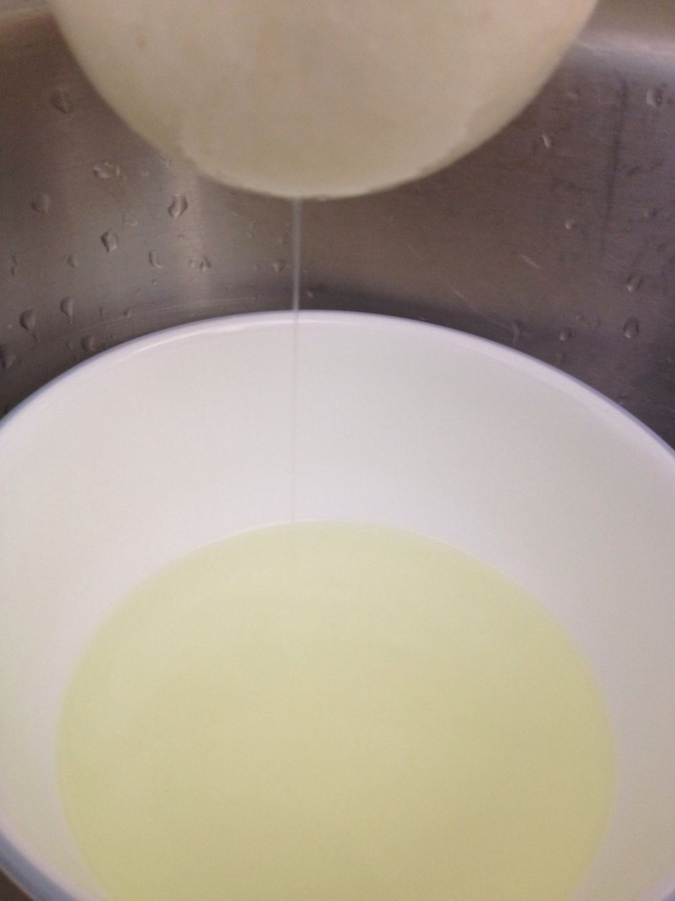 The water will start to drain. I let mine hang for 2 hours. It depends on how thick you prefer the yogurt to be. Don't let it hang for more than 3 hours as it will start to turn sour.