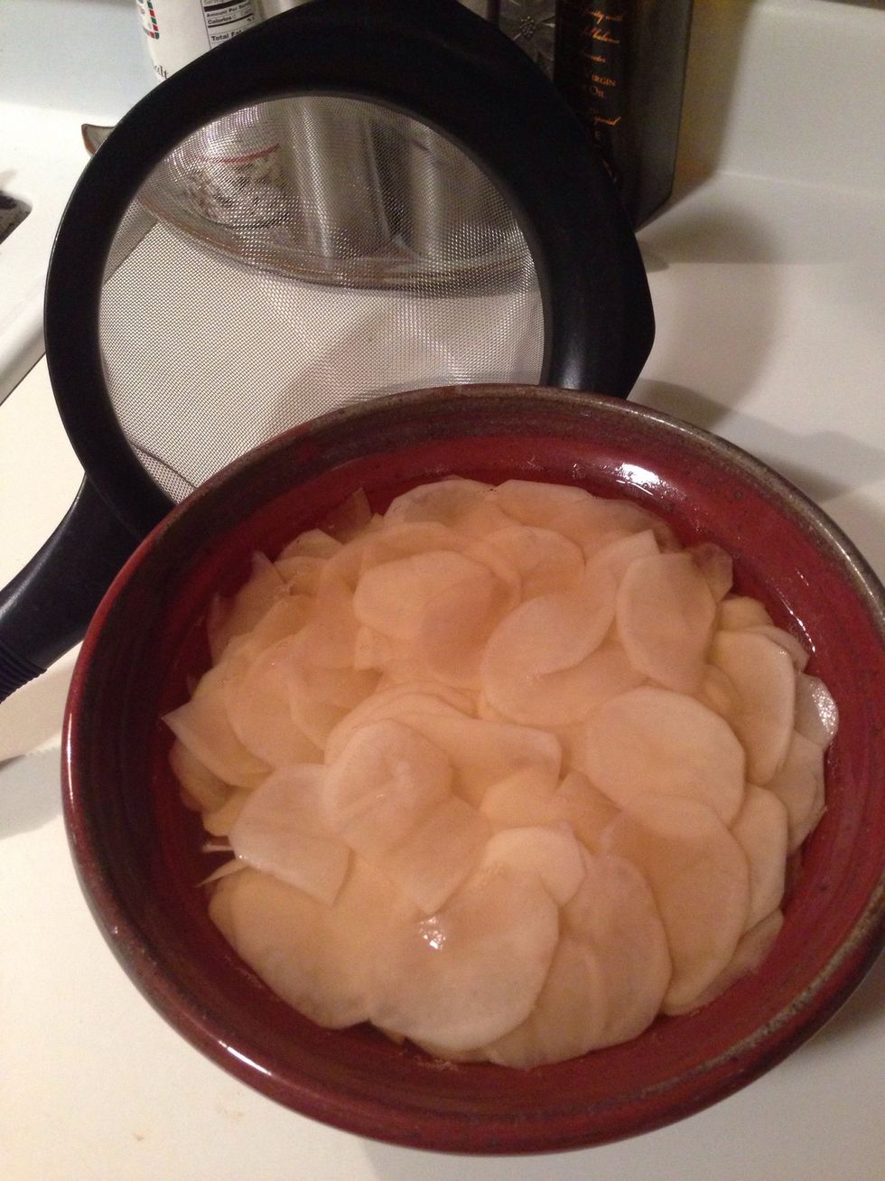 The water will turn a little brown, but that's totally normal. Get your handy dandy strainer and get rid of the water.